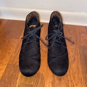 Black wedge booties